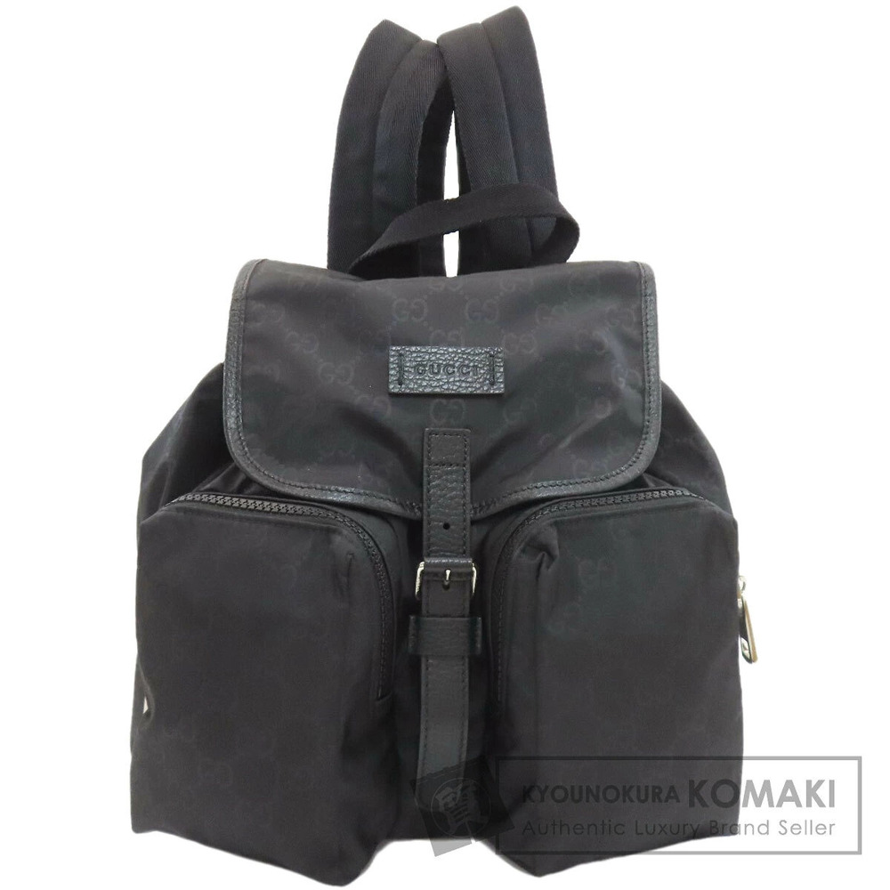 Gucci black GG backpack monogram pattern dual zippered front pockets flap